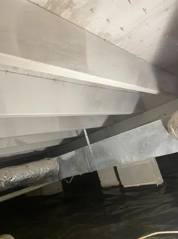 Crawlspace vapor barrier installation during encapsulation service in Benton