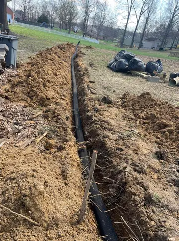 Drainage system and French drain trench installation for crawlspace waterproofing